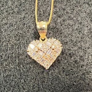 14 k Gold Heart Pendant Necklace 22” with various shape CZ stones.